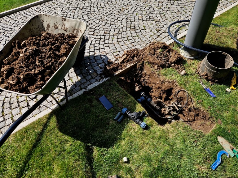 Automatic irrigation installer's workplace with sprinkler installation